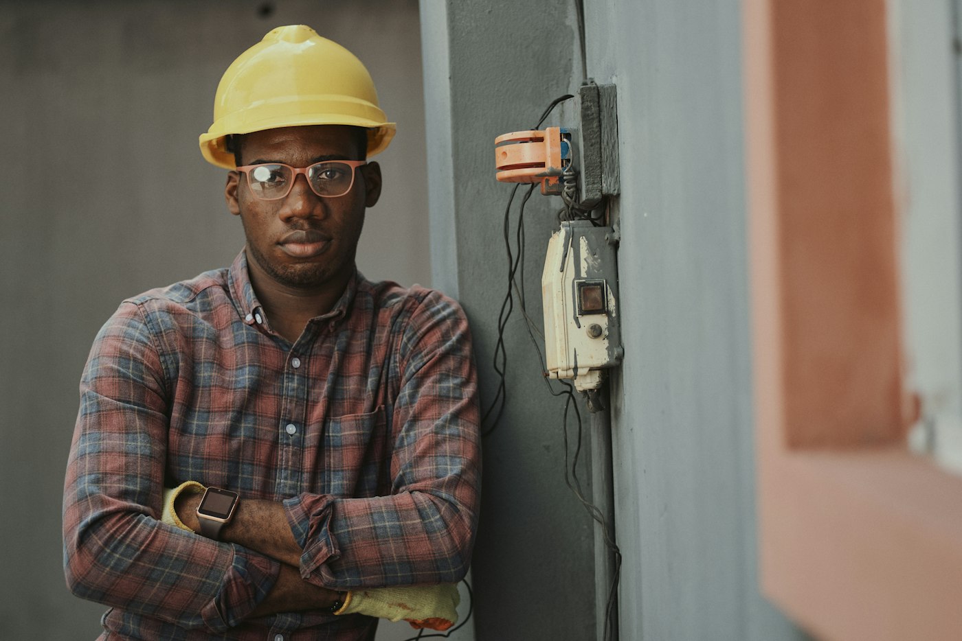 Electrician working at a home panel
