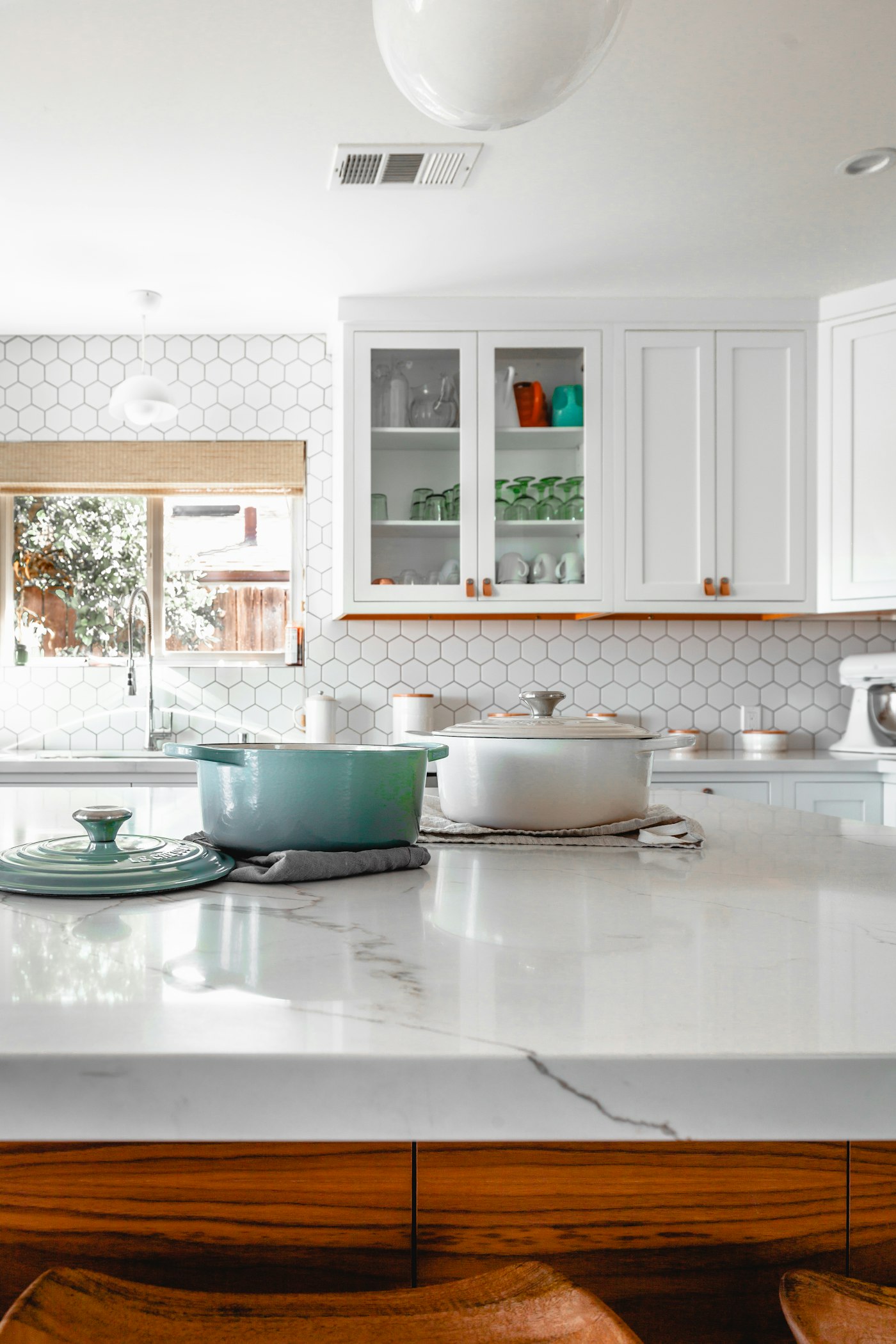 Bright kitchen with covered appliances